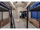 Bedroom with two twin-size bunk beds and mirrored closet at 14828 N 15Th Ave, Phoenix, AZ 85023