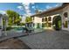 Inviting pool area with patio, glass fencing, and lounge chairs at 14828 N 15Th Ave, Phoenix, AZ 85023