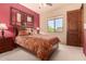Charming bedroom with a warm color palette and ample natural light at 37295 N Boulder View Dr, Scottsdale, AZ 85262