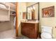 Convenient bathroom with a single sink and linen closet at 37295 N Boulder View Dr, Scottsdale, AZ 85262