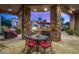 Outdoor patio with seating area and built-in grill at 37295 N Boulder View Dr, Scottsdale, AZ 85262