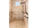 Large walk-in shower with tiled walls and built-in seat at 37295 N Boulder View Dr, Scottsdale, AZ 85262