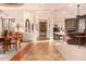 Spacious living area with hardwood floors, a stone fireplace, and comfortable seating at 37295 N Boulder View Dr, Scottsdale, AZ 85262