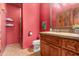 Well-appointed bathroom with wood vanity and updated fixtures at 37295 N Boulder View Dr, Scottsdale, AZ 85262