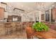 Gourmet kitchen with island, stainless steel appliances, and stone accents at 37295 N Boulder View Dr, Scottsdale, AZ 85262