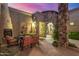 Relaxing outdoor patio with seating area and fireplace, perfect for entertaining at 37295 N Boulder View Dr, Scottsdale, AZ 85262