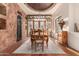 Elegant dining room with hardwood floors and access to the patio at 37295 N Boulder View Dr, Scottsdale, AZ 85262