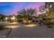 Beautiful home exterior with welcoming landscaping and lighting at 37295 N Boulder View Dr, Scottsdale, AZ 85262