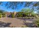 Stunning Spanish-style home with a brick driveway and beautifully landscaped grounds at 37295 N Boulder View Dr, Scottsdale, AZ 85262
