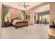 Spacious main bedroom with a king-size bed and an attached office at 37295 N Boulder View Dr, Scottsdale, AZ 85262