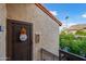 Front entrance with security door and welcome decor at 10410 N Cave Creek Rd # 2224, Phoenix, AZ 85020