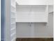 Walk-in closet with shelving and hanging rods at 11235 E Pampa Ave, Mesa, AZ 85212