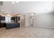 Open kitchen with an island and dark cabinets at 11235 E Pampa Ave, Mesa, AZ 85212