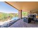 Relaxing pool and patio area with scenic background at 15512 E Desert Hawk Trl, Fountain Hills, AZ 85268