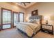 Bright bedroom with a comfortable bed, and plenty of natural light at 15512 E Desert Hawk Trl, Fountain Hills, AZ 85268