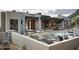 Luxury home with inviting pool, expansive patio, and modern furniture at 10071 E Aniko Dr, Scottsdale, AZ 85262
