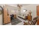 Home office with wood desk, futon, and a ceiling fan at 1729 Leisure World --, Mesa, AZ 85206