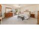Main bedroom with dresser, sliding door, and ensuite at 1729 Leisure World --, Mesa, AZ 85206