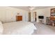 Main bedroom with dresser, bookcase, and a flat-screen TV at 1729 Leisure World --, Mesa, AZ 85206