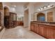 Elegant bathroom with marble finishes, double vanity, and large shower at 26615 N 71St Pl, Scottsdale, AZ 85266