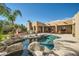 Inviting pool area with built-in barbecue and spacious patio at 26615 N 71St Pl, Scottsdale, AZ 85266
