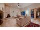 Relaxing living room with a fireplace and comfortable seating at 26615 N 71St Pl, Scottsdale, AZ 85266