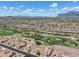 Aerial view of community, golf course and mountains at 8870 E Greenview Dr, Gold Canyon, AZ 85118