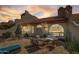 Charming patio with seating area and mountain views at 8870 E Greenview Dr, Gold Canyon, AZ 85118