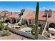 Backyard patio with seating area and grill at 8870 E Greenview Dr, Gold Canyon, AZ 85118