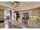 Kitchen with granite countertops, stainless steel appliances and island at 8870 E Greenview Dr, Gold Canyon, AZ 85118