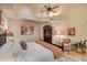 Spacious bedroom with a comfortable bed and plenty of natural light at 8870 E Greenview Dr, Gold Canyon, AZ 85118