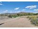 View of a beautiful golf course and mountain range at 8870 E Greenview Dr, Gold Canyon, AZ 85118