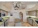 Well-equipped kitchen with granite countertops and stainless steel appliances at 8870 E Greenview Dr, Gold Canyon, AZ 85118
