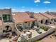 Large patio with seating area and outdoor fireplace at 8870 E Greenview Dr, Gold Canyon, AZ 85118