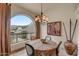 Charming dining area with mountain views and a table for four at 8870 E Greenview Dr, Gold Canyon, AZ 85118