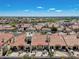 Aerial view of community with Spanish-style homes and desert landscape at 8870 E Greenview Dr, Gold Canyon, AZ 85118