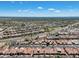 Aerial view of community with multiple homes and surrounding landscape at 8870 E Greenview Dr, Gold Canyon, AZ 85118
