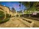 Stone courtyard with fountain and string lights at 6107 E Paradise Dr, Scottsdale, AZ 85254