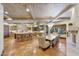 Spacious kitchen with island, custom cabinetry, and terracotta tile floors at 6107 E Paradise Dr, Scottsdale, AZ 85254