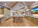Gourmet kitchen boasting a large island, custom cabinetry, and high-end appliances at 6107 E Paradise Dr, Scottsdale, AZ 85254