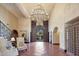 Impressive entryway with ornate doors and views to the backyard at 6107 E Paradise Dr, Scottsdale, AZ 85254