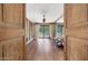Serene yoga studio with hardwood floors and access to the backyard at 6107 E Paradise Dr, Scottsdale, AZ 85254