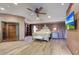Spacious bedroom with hardwood floors and large windows at 6107 E Paradise Dr, Scottsdale, AZ 85254