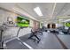 Private home gym, well-equipped with cardio and strength training machines at 6107 E Paradise Dr, Scottsdale, AZ 85254