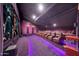 Home theater with luxurious seating and large projection screen at 6107 E Paradise Dr, Scottsdale, AZ 85254