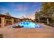 Expansive pool and patio area with multiple lounge chairs at 6107 E Paradise Dr, Scottsdale, AZ 85254