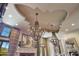 Ornate chandelier in formal dining room at 6107 E Paradise Dr, Scottsdale, AZ 85254
