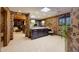 Elegant bathroom with a large vanity, soaking tub, and walk-in closet at 6107 E Paradise Dr, Scottsdale, AZ 85254