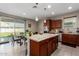 Kitchen with an island, stainless steel appliances, and lots of light at 2440 E Saint Catherine Ave, Phoenix, AZ 85042