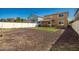 Artificial turf backyard with privacy fence at 2440 E Saint Catherine Ave, Phoenix, AZ 85042